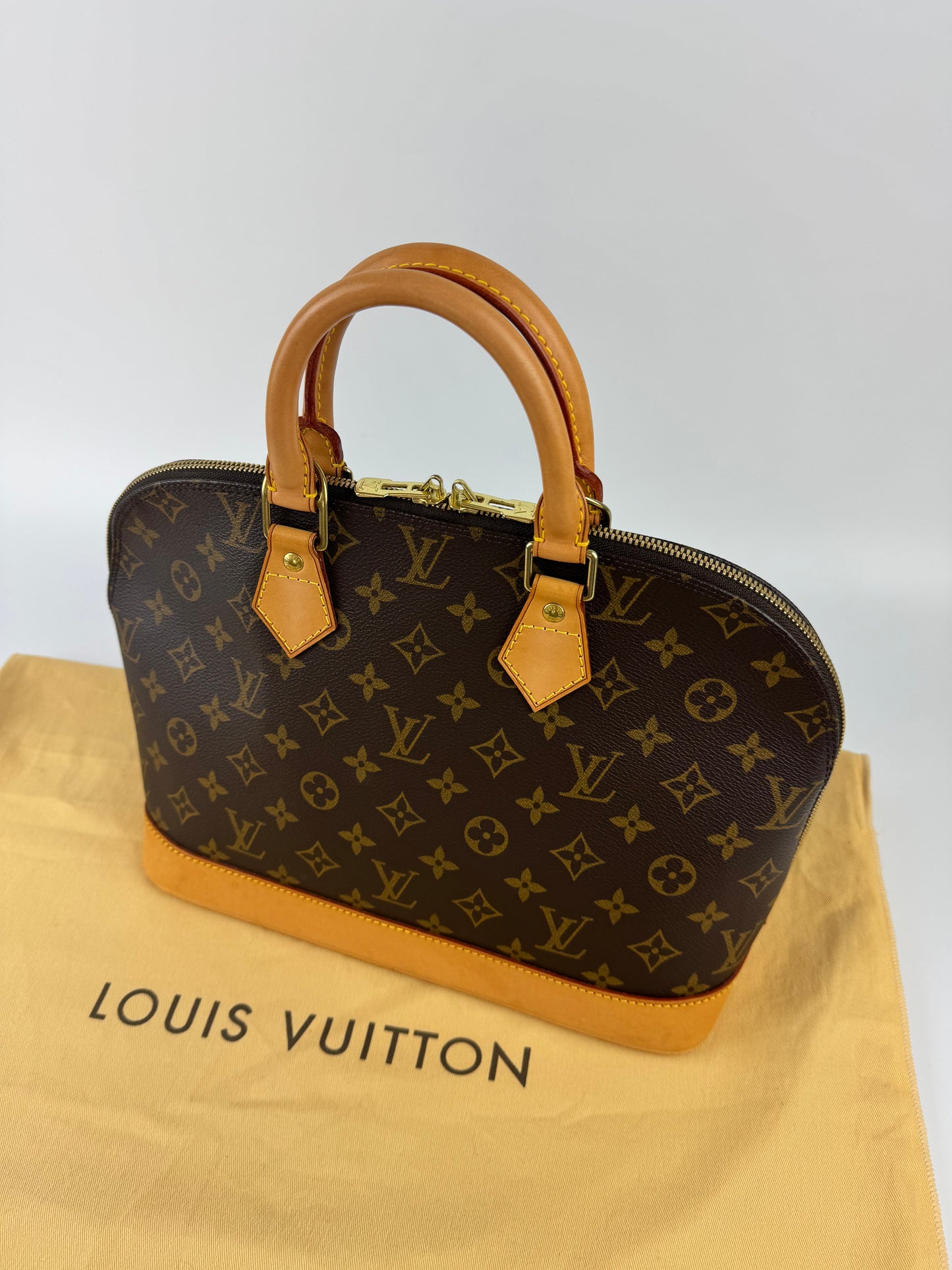 Louis Vuitton Alma Handbag