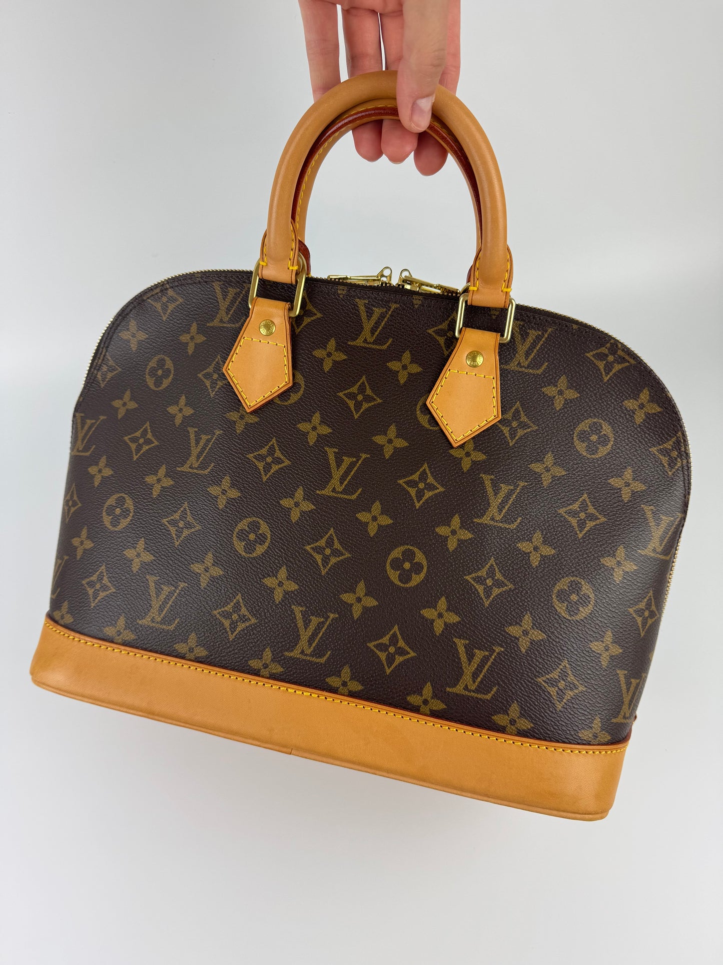Louis Vuitton Alma Handbag