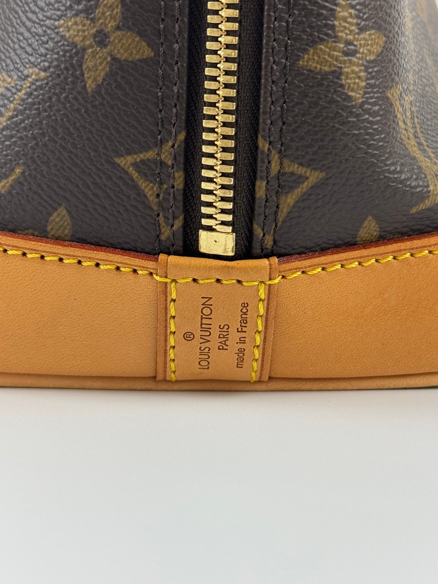 Louis Vuitton Alma Handbag