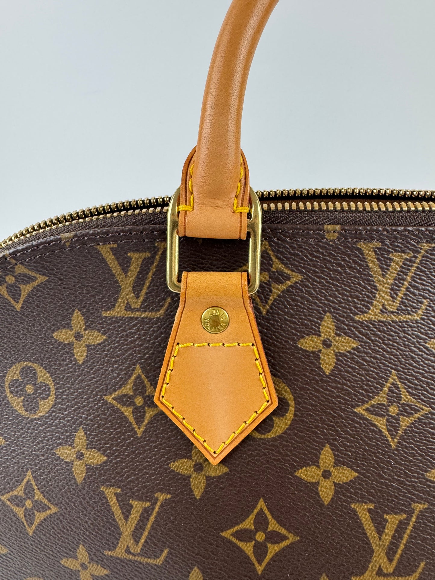 Louis Vuitton Alma Handbag