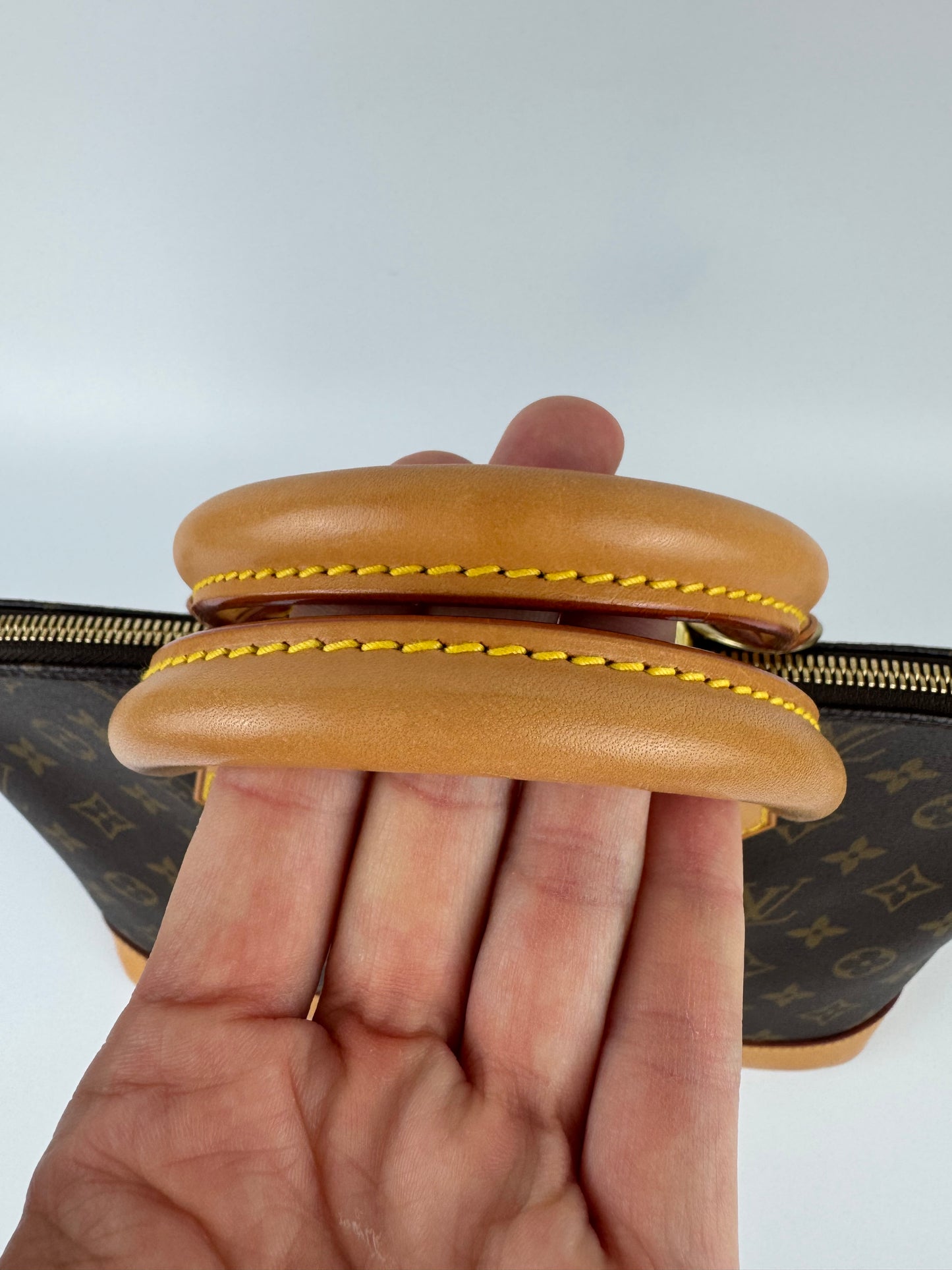 Louis Vuitton Alma Handbag